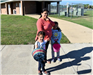 Mother and Two Daughters with Easter Baskets
